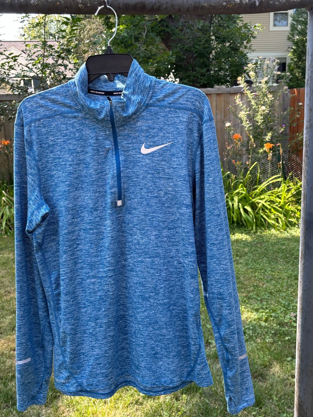 Women’s DriFit Nike Quarter Zip Size Medium.